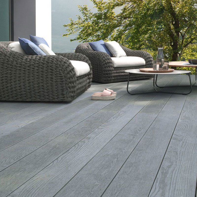 decking kit deck gray with furniture on them